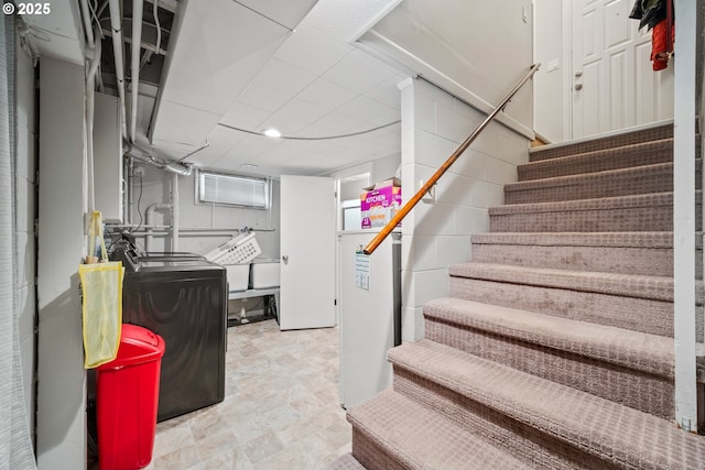 interior space with washing machine and dryer