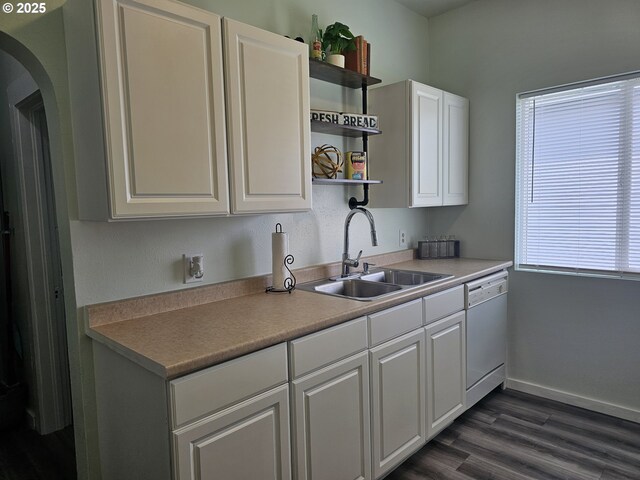 617 SW 3rd St, Pendleton, OR 97801 - kitchen featuring white dishwasher, open shelves, a sink, white cabinetry, and dark wood finished floors