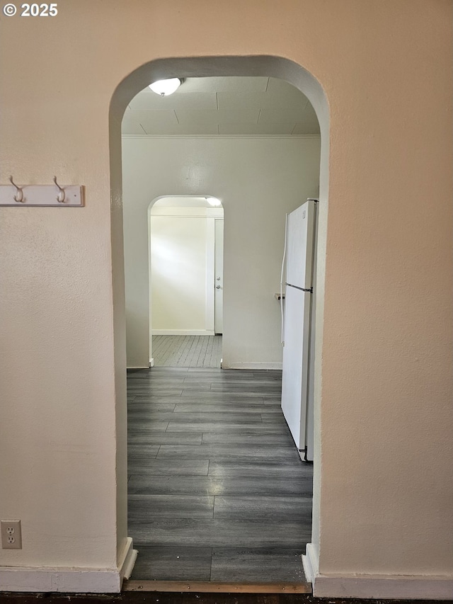 617 SW 3rd St, Pendleton, OR 97801 - hallway featuring dark wood-style floors and arched walkways