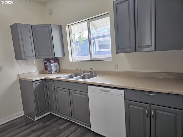 617 SW 3rd St, Pendleton, OR 97801 - kitchen featuring white dishwasher, a sink, gray cabinetry, dark wood-style floors, and crown molding