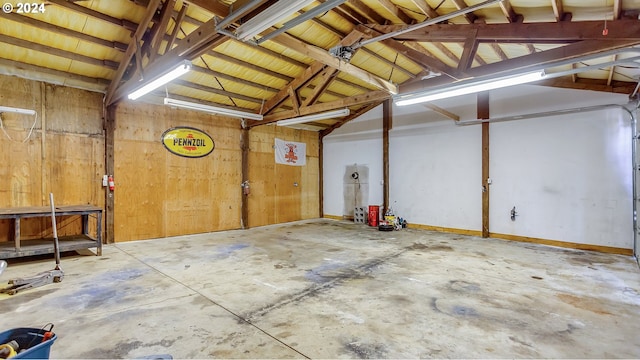 garage with wood walls
