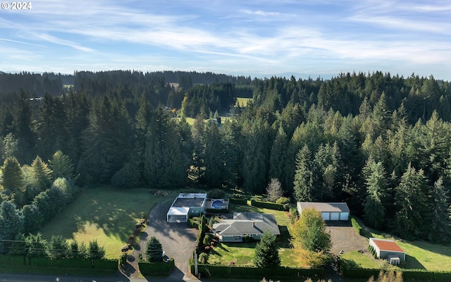 aerial view featuring a forest view