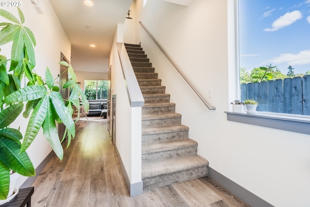 2904 SE 87th Ave, Portland, OR 97266 - staircase with wood finished floors, recessed lighting, and baseboards