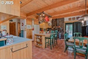 kitchen featuring beam ceiling and wooden ceiling