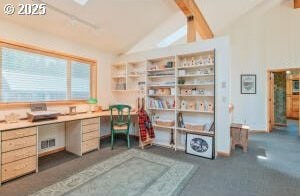 office area featuring vaulted ceiling with beams