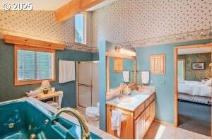 bathroom featuring vanity and vaulted ceiling with beams