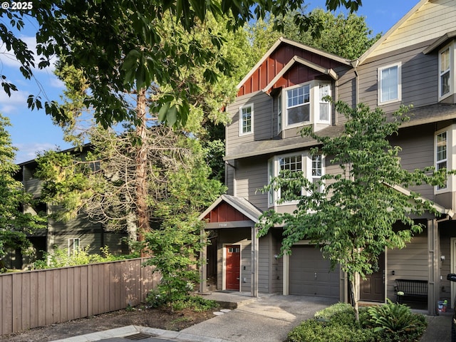 7804 SW Brookline Ln, Portland, OR 97224 - craftsman house featuring a garage, driveway, and board and batten siding