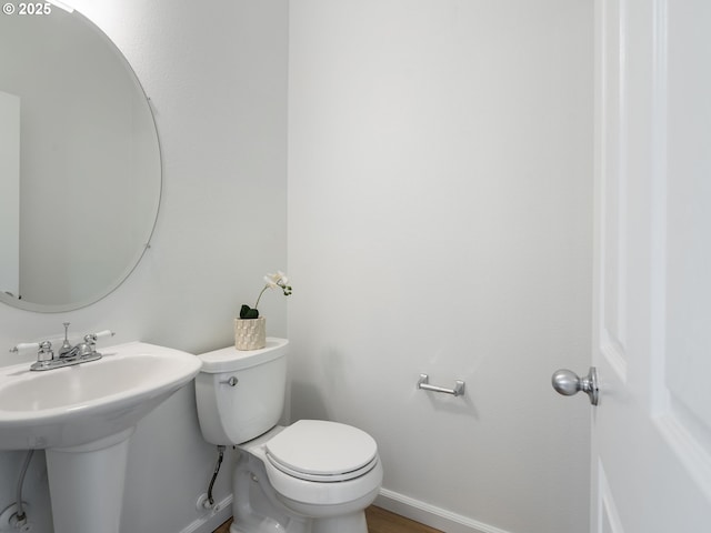 7804 SW Brookline Ln, Portland, OR 97224 - bathroom with baseboards and wood finished floors