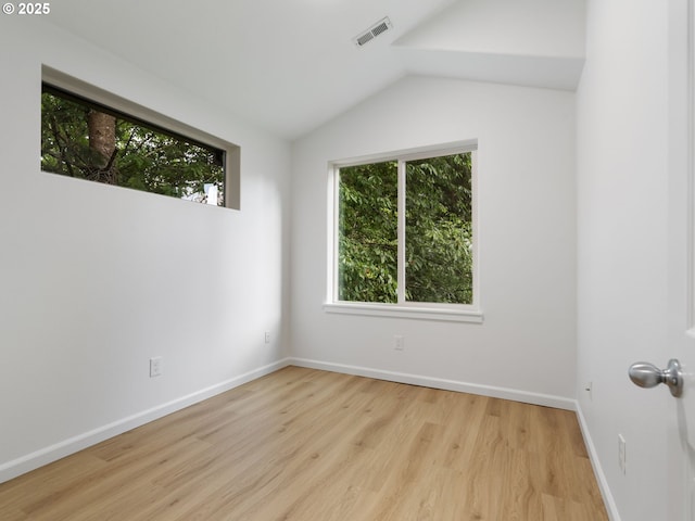 7804 SW Brookline Ln, Portland, OR 97224 - empty room with wood finished floors and vaulted ceiling