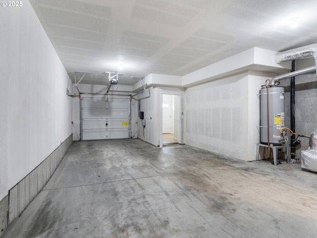 7804 SW Brookline Ln, Portland, OR 97224 - garage featuring strapped water heater and a garage door opener