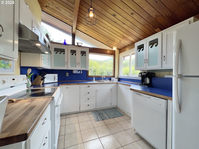25760 Nedonna Ave, Rockaway Beach, OR 97136 - kitchen featuring white appliances, ventilation hood, light tile patterned flooring, vaulted ceiling, and wooden ceiling