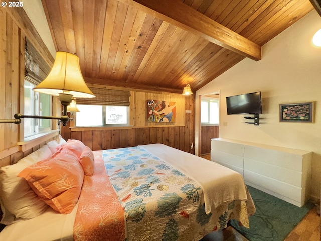 25760 Nedonna Ave, Rockaway Beach, OR 97136 - bedroom featuring wood walls, wooden ceiling, and carpet
