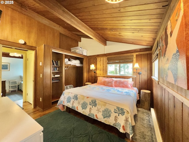 25760 Nedonna Ave, Rockaway Beach, OR 97136 - bedroom featuring wooden walls, wood finished floors, wood ceiling, and a closet