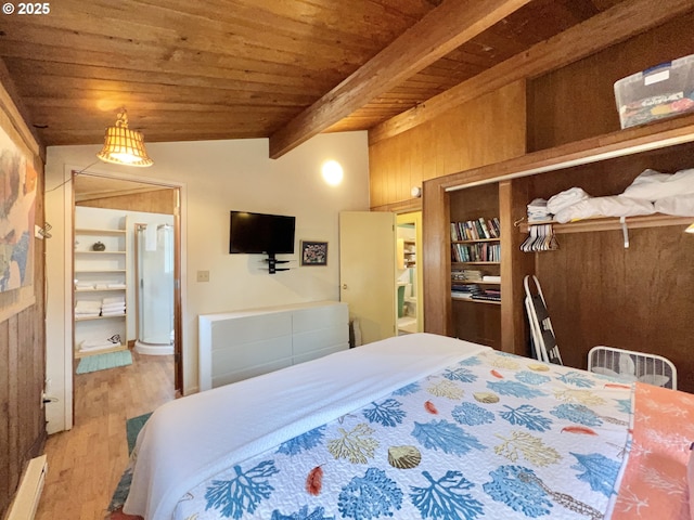 25760 Nedonna Ave, Rockaway Beach, OR 97136 - bedroom with a baseboard radiator, a wood ceiling with exposed beams, light wood finished floors, and wood walls
