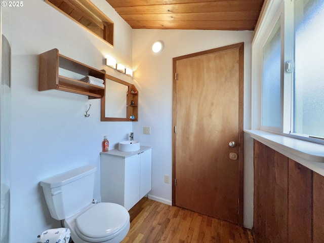 25760 Nedonna Ave, Rockaway Beach, OR 97136 - bathroom featuring wood ceiling, vanity, wood finished floors, and vaulted ceiling