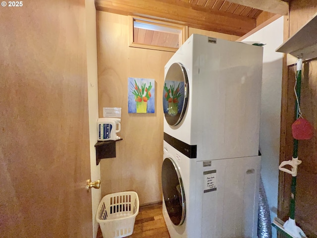 25760 Nedonna Ave, Rockaway Beach, OR 97136 - laundry area featuring estacked washer and dryer, wooden ceiling, and wood finished floors