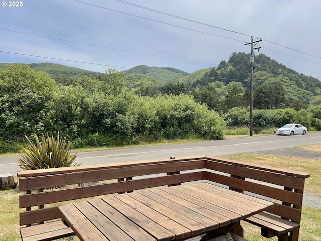 25760 Nedonna Ave, Rockaway Beach, OR 97136 - wooden terrace with a forest view