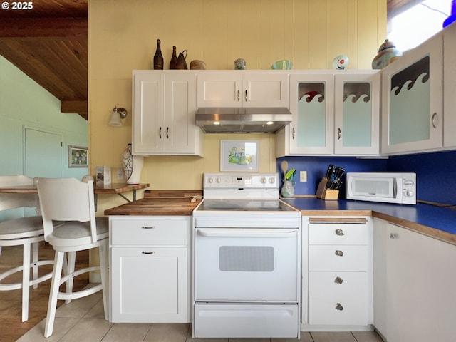 25760 Nedonna Ave, Rockaway Beach, OR 97136 - kitchen with ventilation hood, white appliances, white cabinets, glass insert cabinets, and wood ceiling