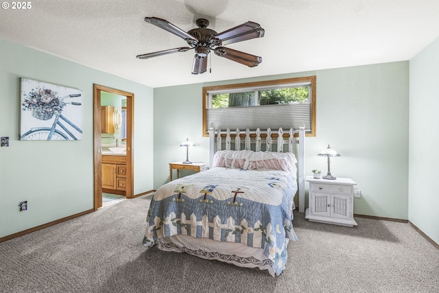 15711 NE 27th Cir, Vancouver, WA 98684 - bedroom featuring carpet, baseboards, ensuite bath, and a ceiling fan