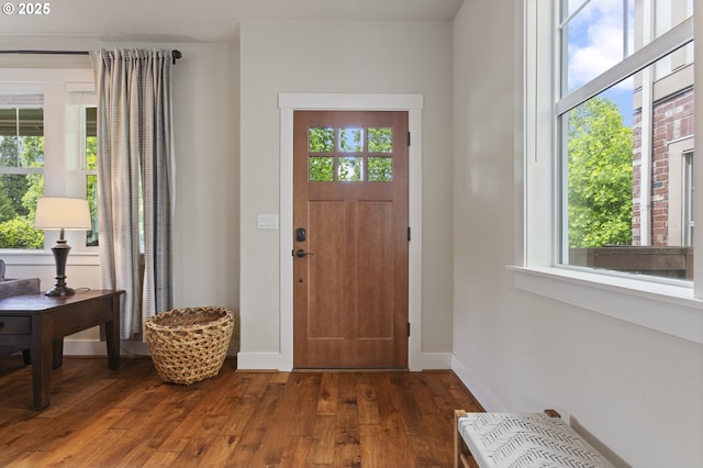 29250 SW Costa Cir E, Wilsonville, OR 97070 - foyer entrance with dark wood-type flooring and baseboards