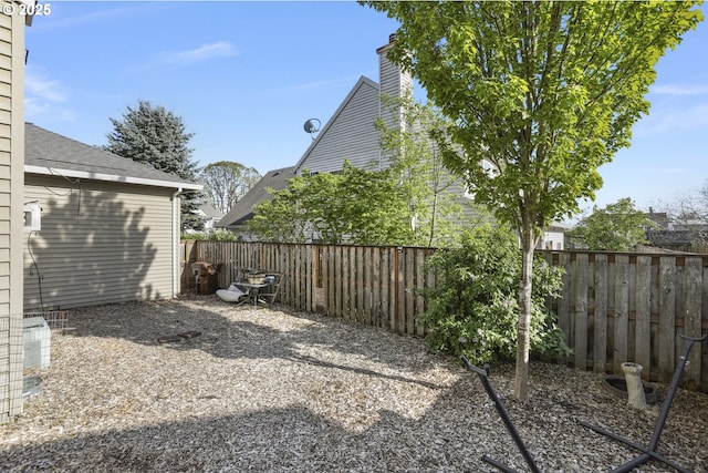 view of yard featuring a fenced backyard