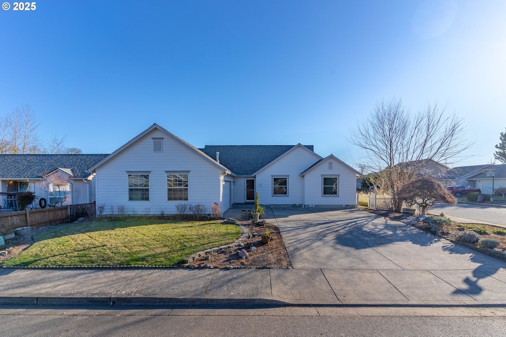 view of front of property with a front lawn