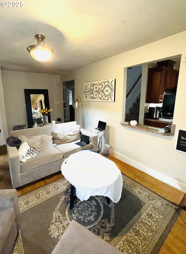 living room with hardwood / wood-style flooring