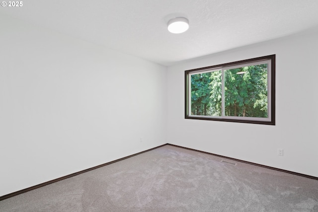 2845 SW Raleighview Dr, Portland, OR 97225 - carpeted spare room featuring baseboards