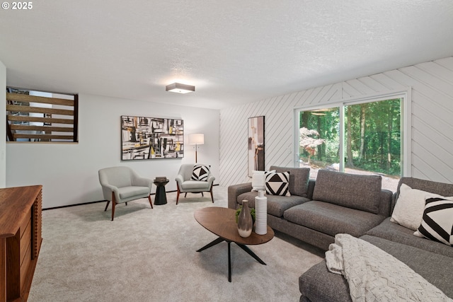 2845 SW Raleighview Dr, Portland, OR 97225 - carpeted living room with a textured ceiling and wooden walls