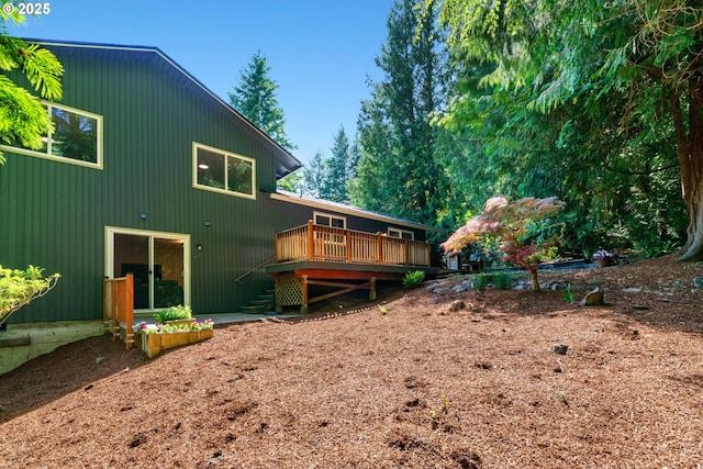 2845 SW Raleighview Dr, Portland, OR 97225 - rear view of property with a wooden deck and stairway