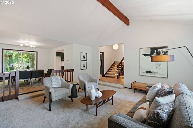 2845 SW Raleighview Dr, Portland, OR 97225 - living room with light colored carpet, stairway, and a chandelier