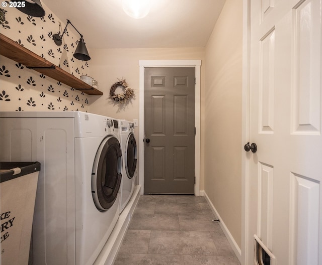laundry room featuring washer and dryer, visible vents, laundry area, and baseboards