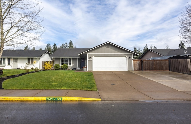 ranch-style home featuring an attached garage, driveway, fence, and a front lawn