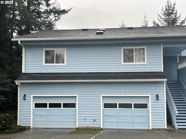 exterior space with a garage