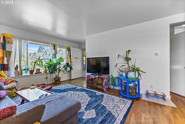520 NW 10th St, Corvallis, OR 97330 - living area featuring baseboards and hardwood / wood-style floors