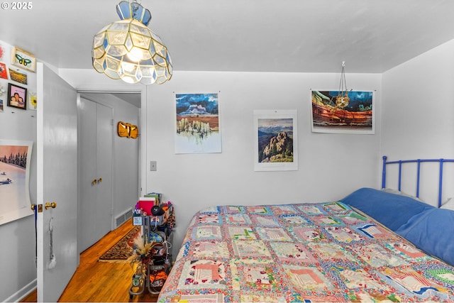 520 NW 10th St, Corvallis, OR 97330 - bedroom with visible vents and wood finished floors