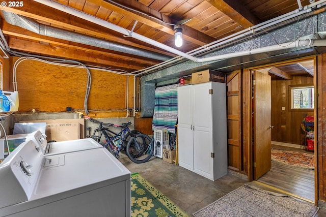 520 NW 10th St, Corvallis, OR 97330 - basement with wooden walls, wood ceiling, and washer and clothes dryer