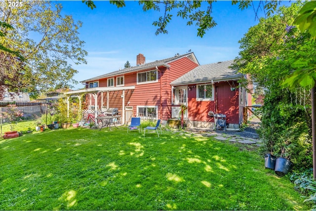 520 NW 10th St, Corvallis, OR 97330 - back of property featuring fence, a chimney, and a yard