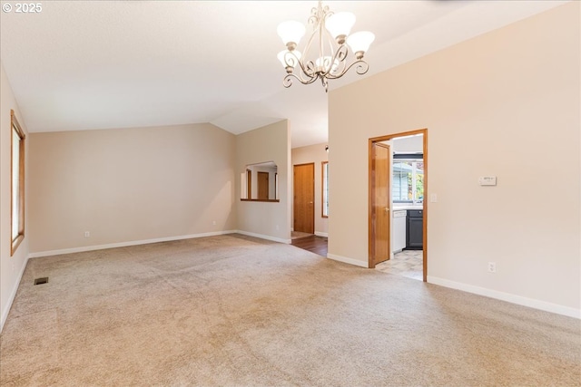 257 SW Nancy Cir, Gresham, OR 97030 - unfurnished room with light colored carpet, a chandelier, and vaulted ceiling