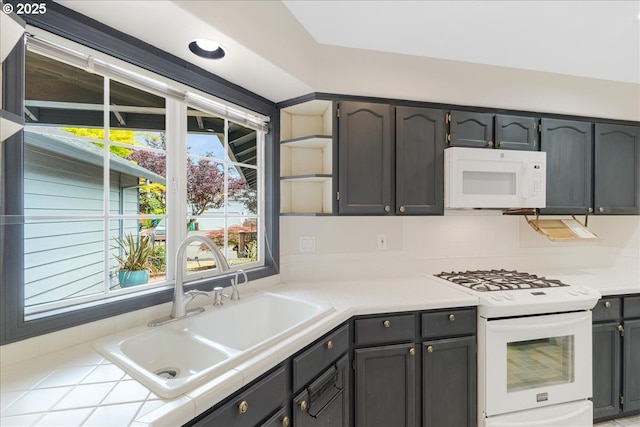 257 SW Nancy Cir, Gresham, OR 97030 - kitchen with white appliances, open shelves, and tile counters