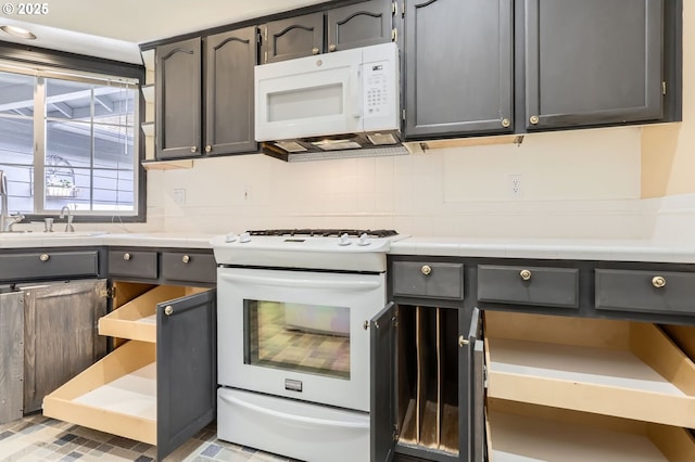 257 SW Nancy Cir, Gresham, OR 97030 - kitchen featuring white appliances and gray cabinetry