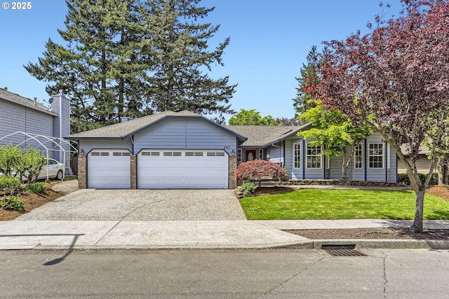 257 SW Nancy Cir, Gresham, OR 97030 - view of front of property with an attached garage, concrete driveway, a front yard, a shingled roof, and brick siding