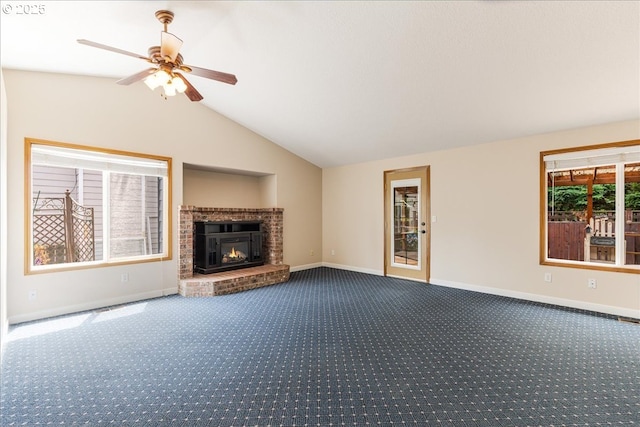 257 SW Nancy Cir, Gresham, OR 97030 - unfurnished living room with vaulted ceiling, dark carpet, a ceiling fan, and a brick fireplace