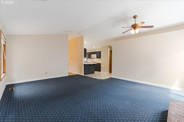 257 SW Nancy Cir, Gresham, OR 97030 - unfurnished living room with a ceiling fan, light colored carpet, and lofted ceiling