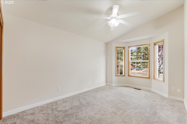 257 SW Nancy Cir, Gresham, OR 97030 - spare room with carpet, vaulted ceiling, and a ceiling fan