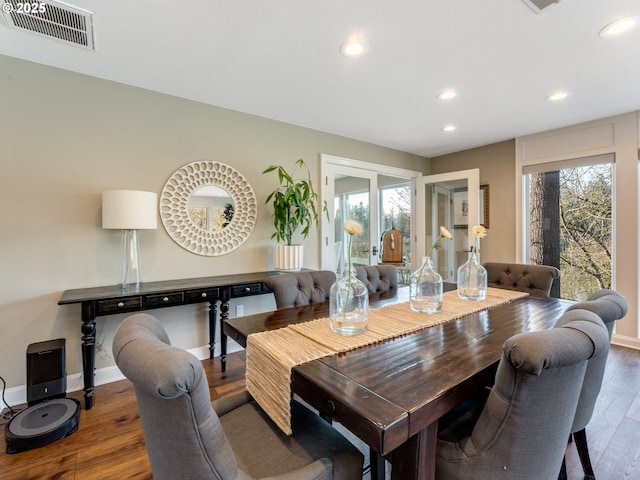 24125 Butteville Rd NE, Aurora, OR 97002 - dining room featuring recessed lighting, wood finished floors, baseboards, and healthy amount of natural light