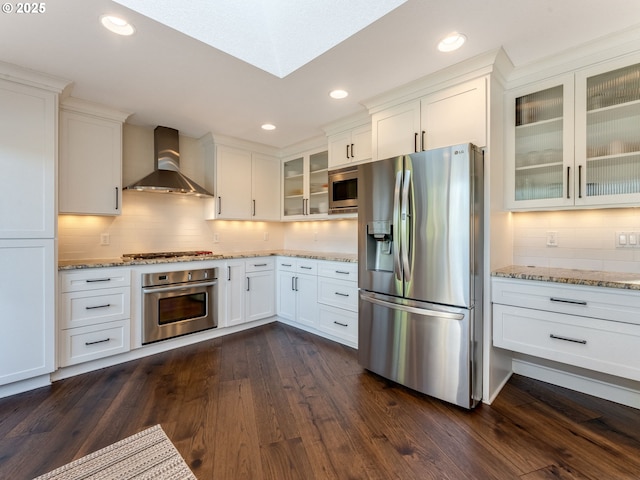 24125 Butteville Rd NE, Aurora, OR 97002 - kitchen with stainless steel appliances, wall chimney exhaust hood, white cabinetry, dark wood-style floors, and recessed lighting