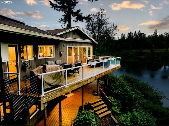 24125 Butteville Rd NE, Aurora, OR 97002 - wooden deck featuring a water view, an outdoor living space, and outdoor dining area