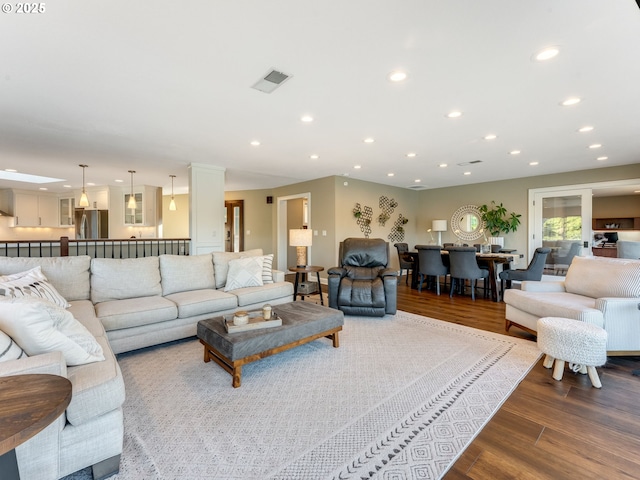 living room with hardwood / wood-style flooring