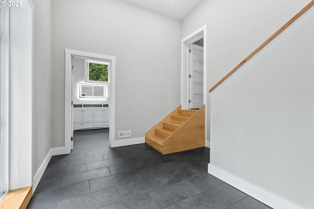16880 Cortez Ct, Lake Oswego, OR 97035 - foyer with stairs, baseboards, and dark tile patterned floors